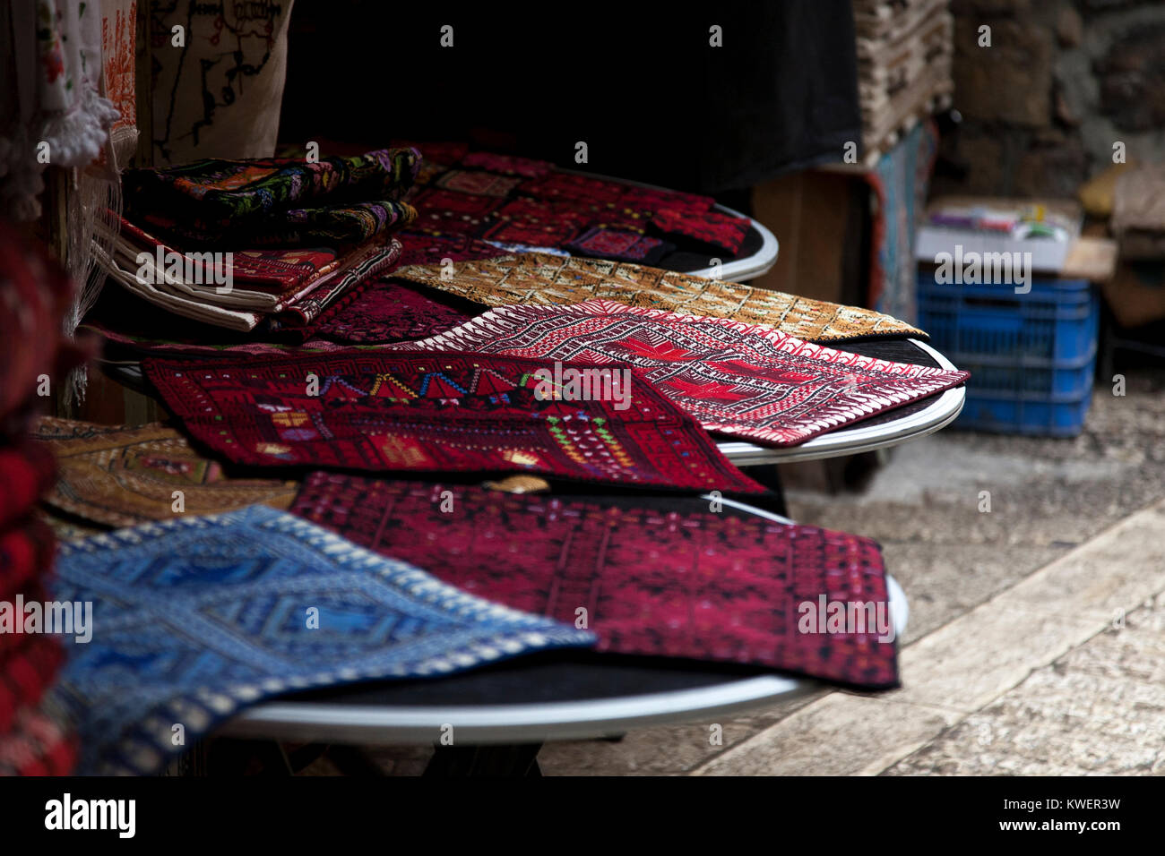 Hebron, Palestine, January 8 2011: Hand embroider pillow cases in a small souvenir shop in old town of Hebron Stock Photo