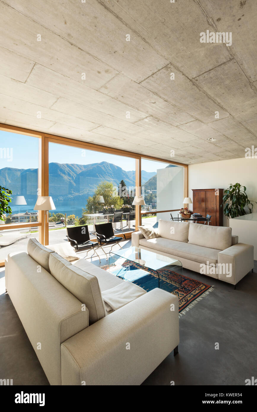 beautiful modern house in cement, interiors, view from the living room