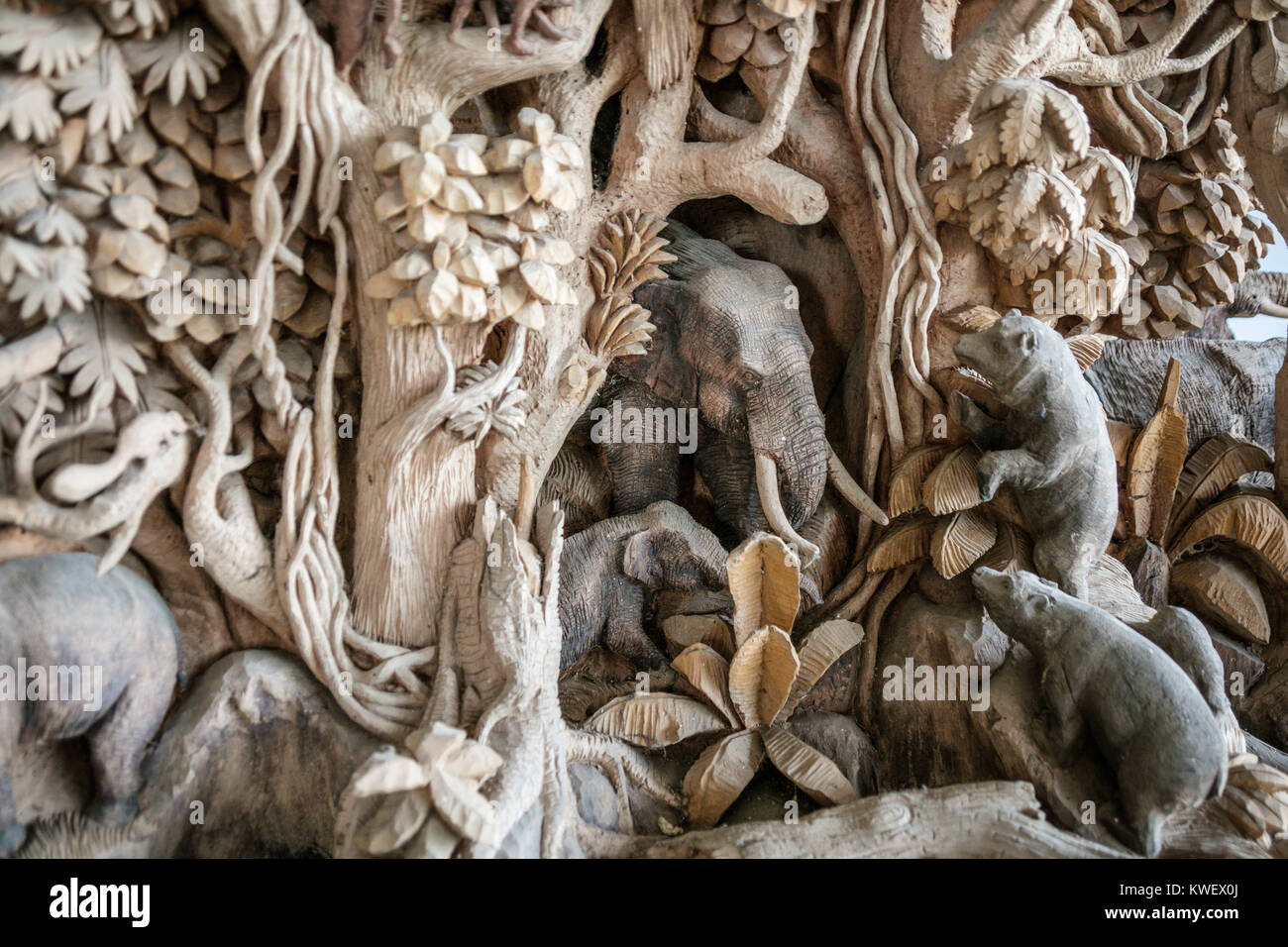 Traditional Thai wood carving, Tambon Damnoen Saduak, Thailand. Stock Photo