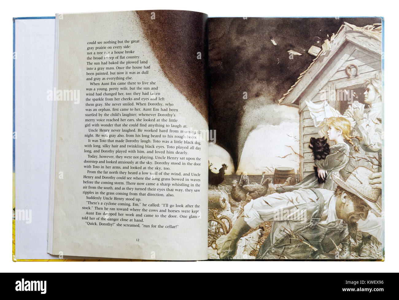 The house being picked up in the tornado in an Illustrated book of The Wizard of Oz Stock Photo