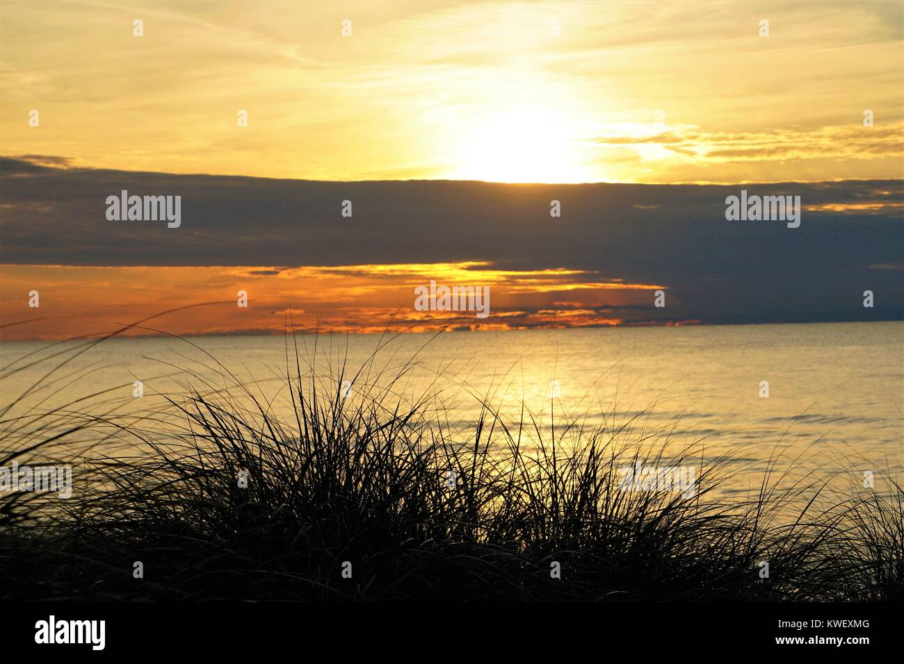 Clouded Sunset Over Lake Michigan Stock Photo