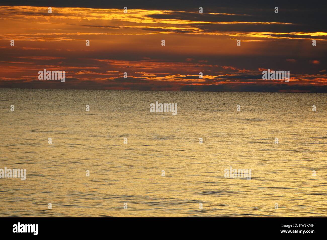 Clouded Sunset Over Lake Michigan Stock Photo