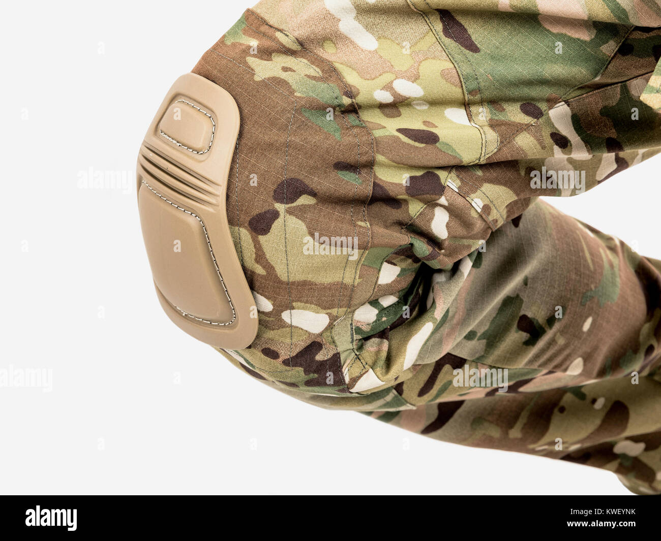 Chest pants for outdated activities. Camouflage pants. Detail of the knee with the wheelbarrow. Stock Photo