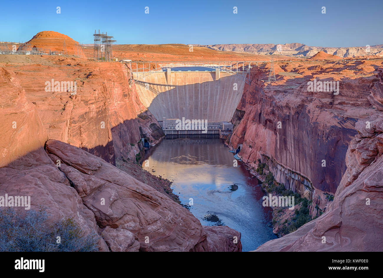 The Glen Canyon Dam on the Colorado River in Page, Arizona was built by the United States Bureau of Reclamation in 1966.  The dam forms Lake Powell Stock Photo