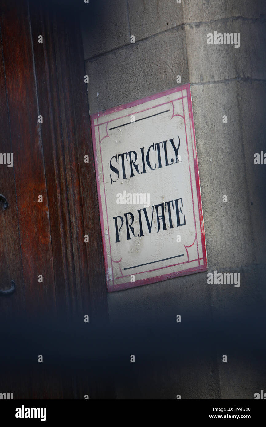 A Strictly Private sign photographed behind cast iron gates in London, UK. Stock Photo