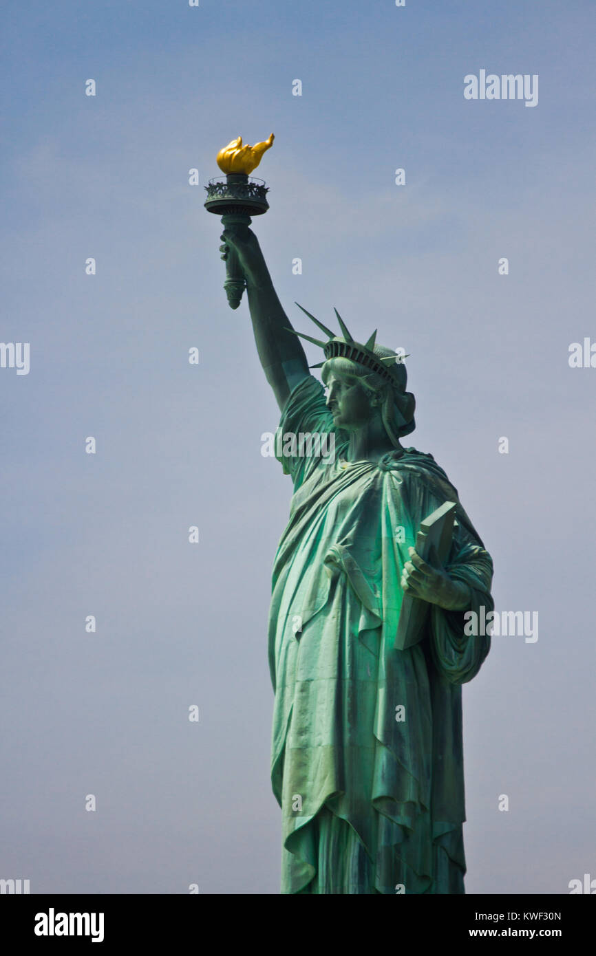 The Statue of Liberty is a colossal neoclassical sculpture on Liberty Island in New York Harbor
