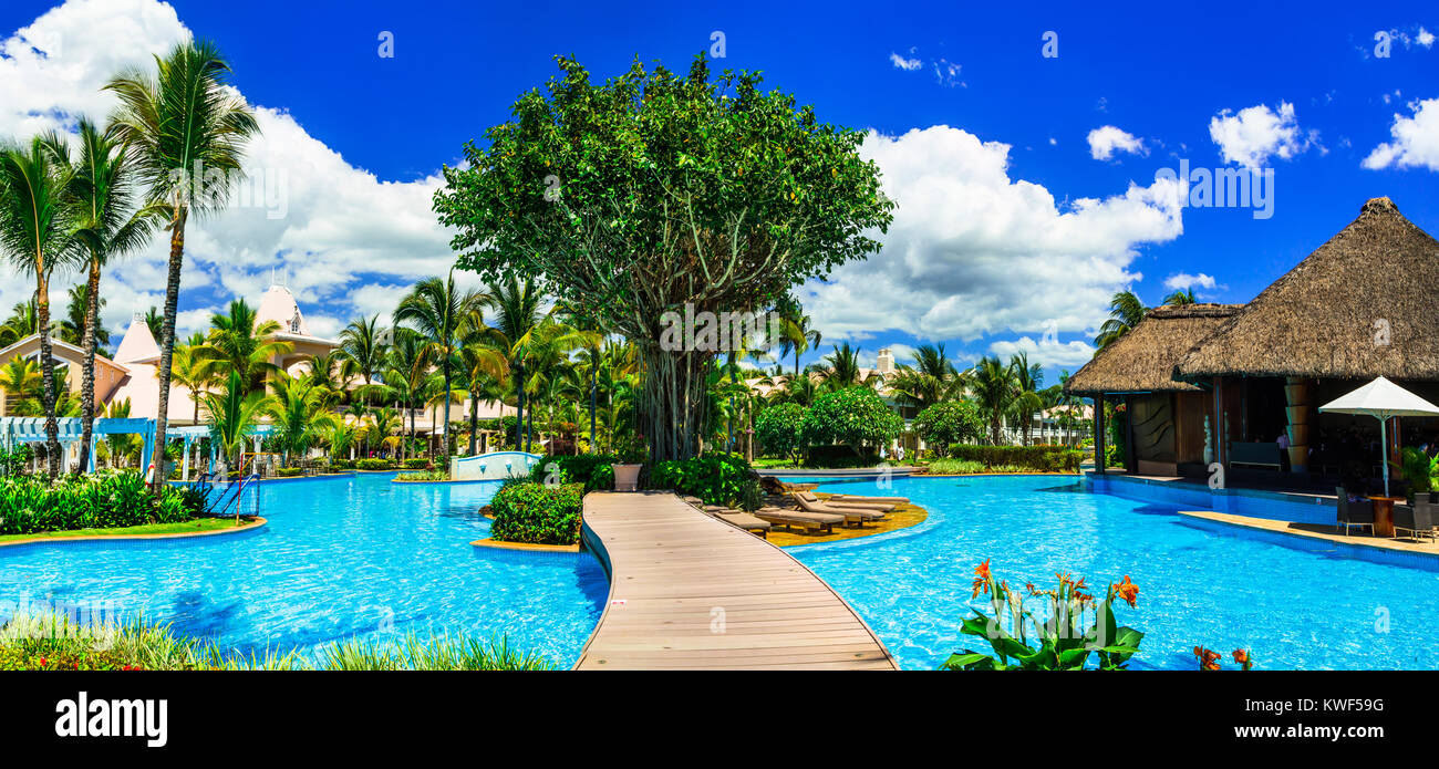 Tropical luxury resort in Mauritius island,view with swimming pool and bungalows. Stock Photo