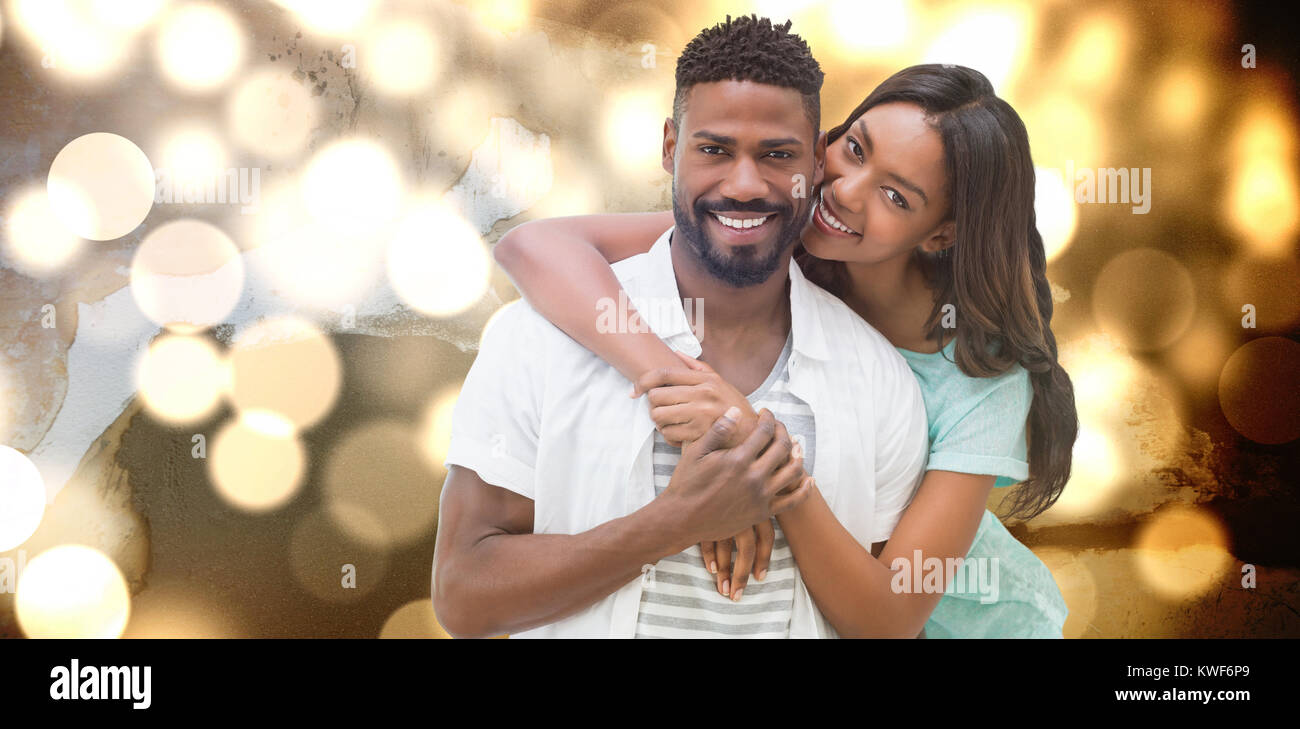 Composite image of portrait of young couple smiling Stock Photo