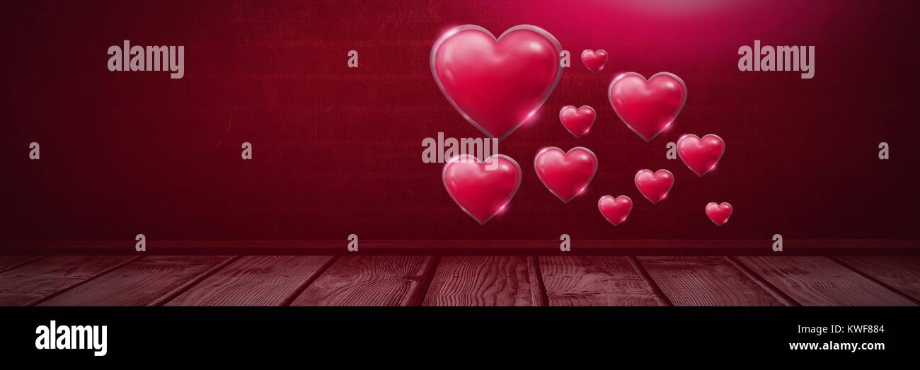 Shiny bubbly Valentines hearts over wooden floor Stock Photo