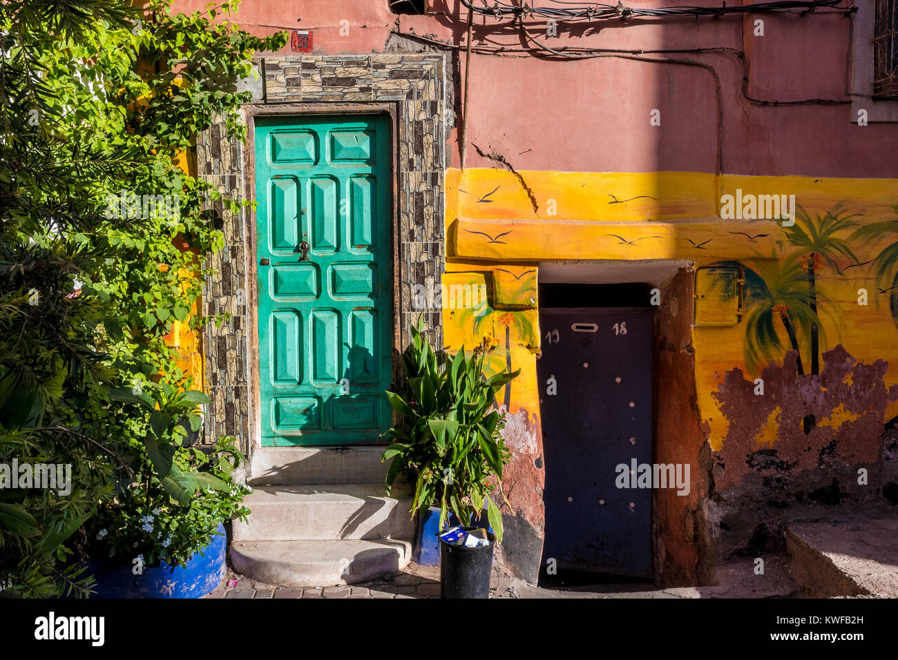 Back street in the medina with traditional architecture, windows, doors and arches. Stock Photo