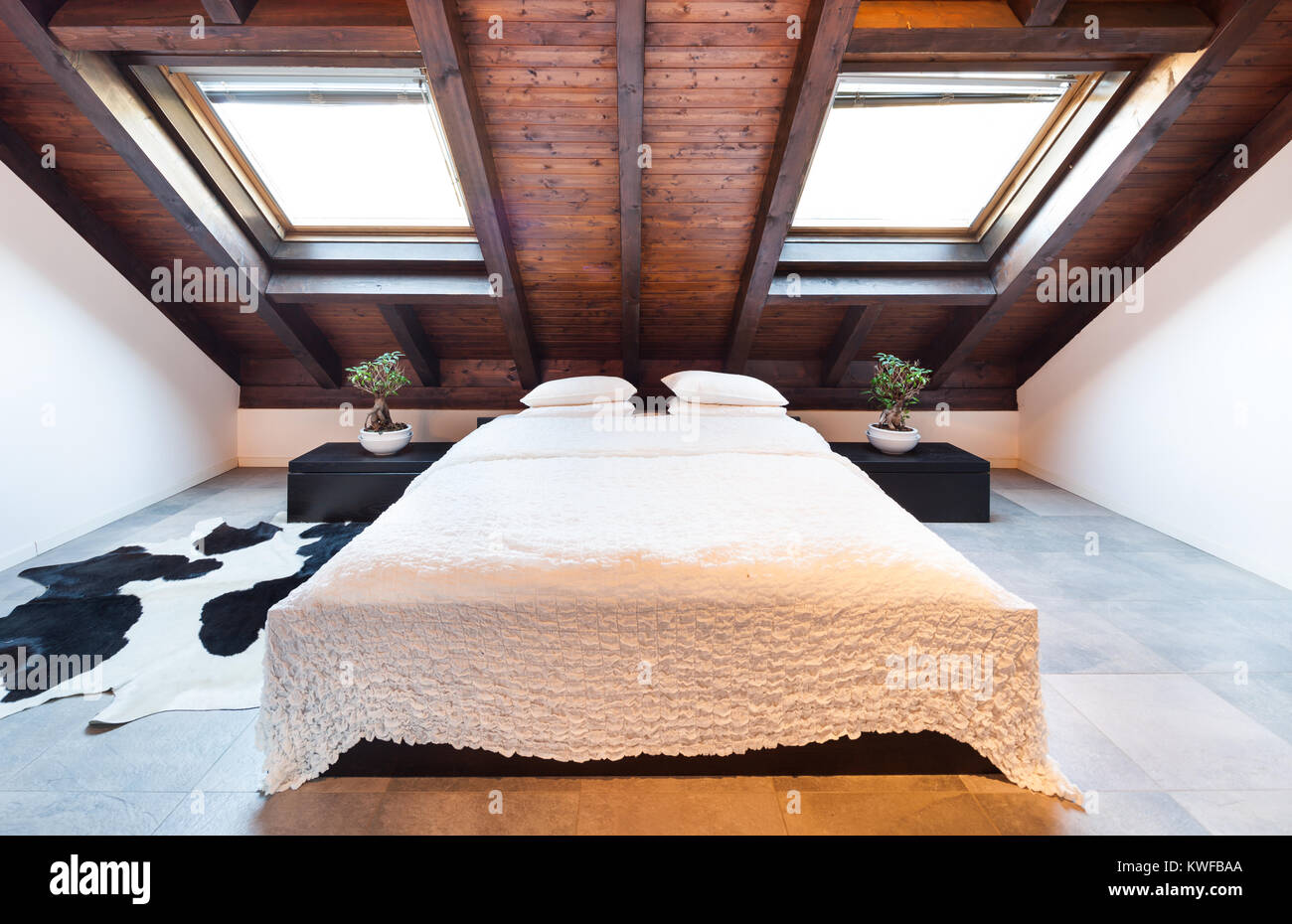 Interior, beautiful loft, luxurious bedroom Stock Photo - Alamy
