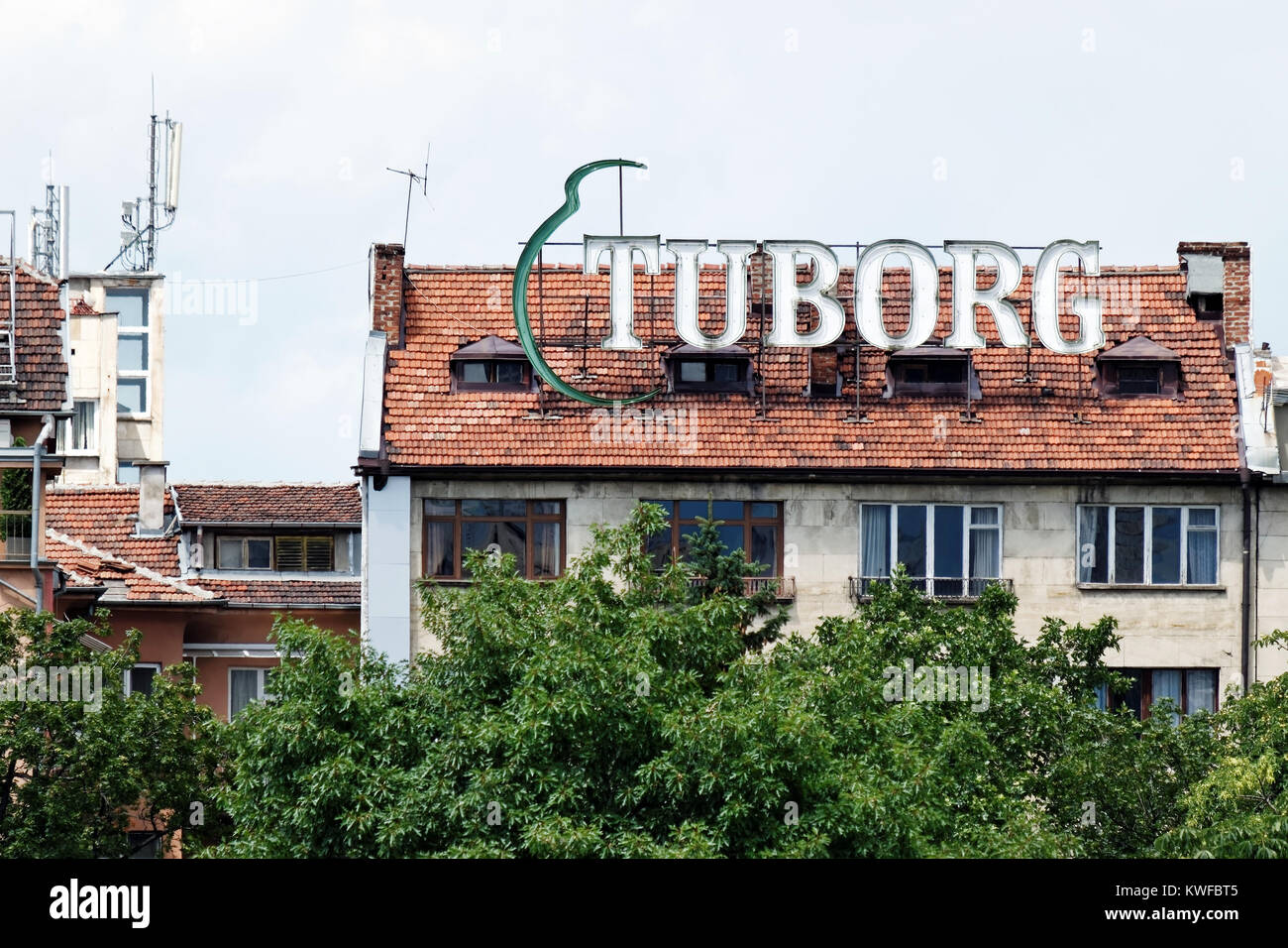 Sofia, Bulgaria - July 04, 2017: Tuborg company logo on a building rooftop. Tuborg is an international company with headquarters in Copenhagen, Denmar Stock Photo