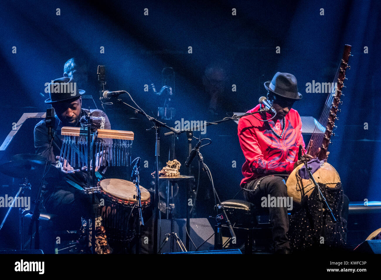 The Gambian musician and kora harp player Dawda Jobarteh (R) performs live  with percussionists Salieu Dibba (L)  and Bakary Mbengue (not pictured) at DR Koncerthuset during P8 Jazz Alive 2017 in Copenhagen. Denmark, 31/03 2017. Stock Photo