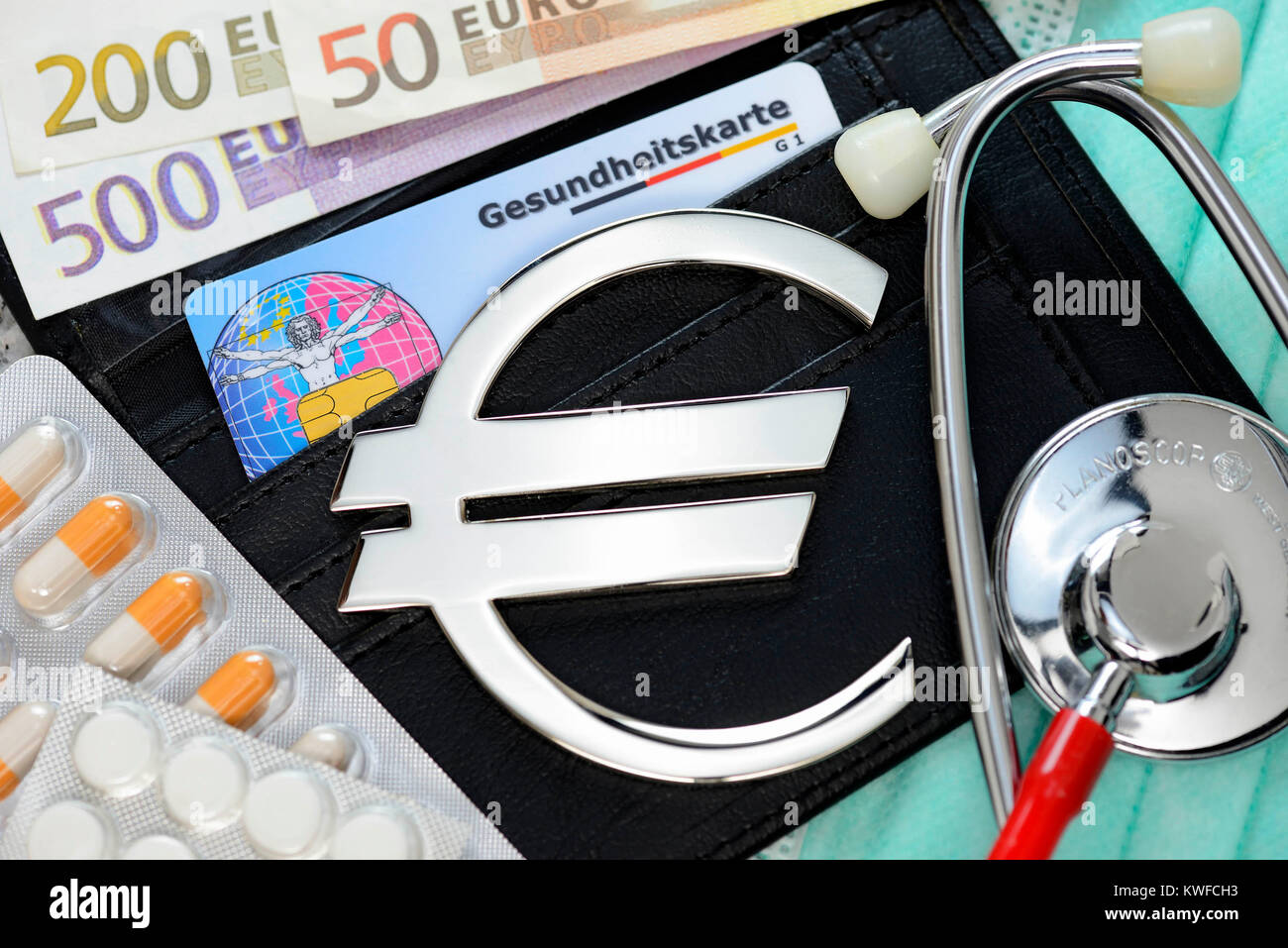 Health map, bank notes, Stethoskop and eurosigns, rise of the health insurance scheme contributions, Gesundheitskarte, Geldscheine, Stethoskop und Eur Stock Photo