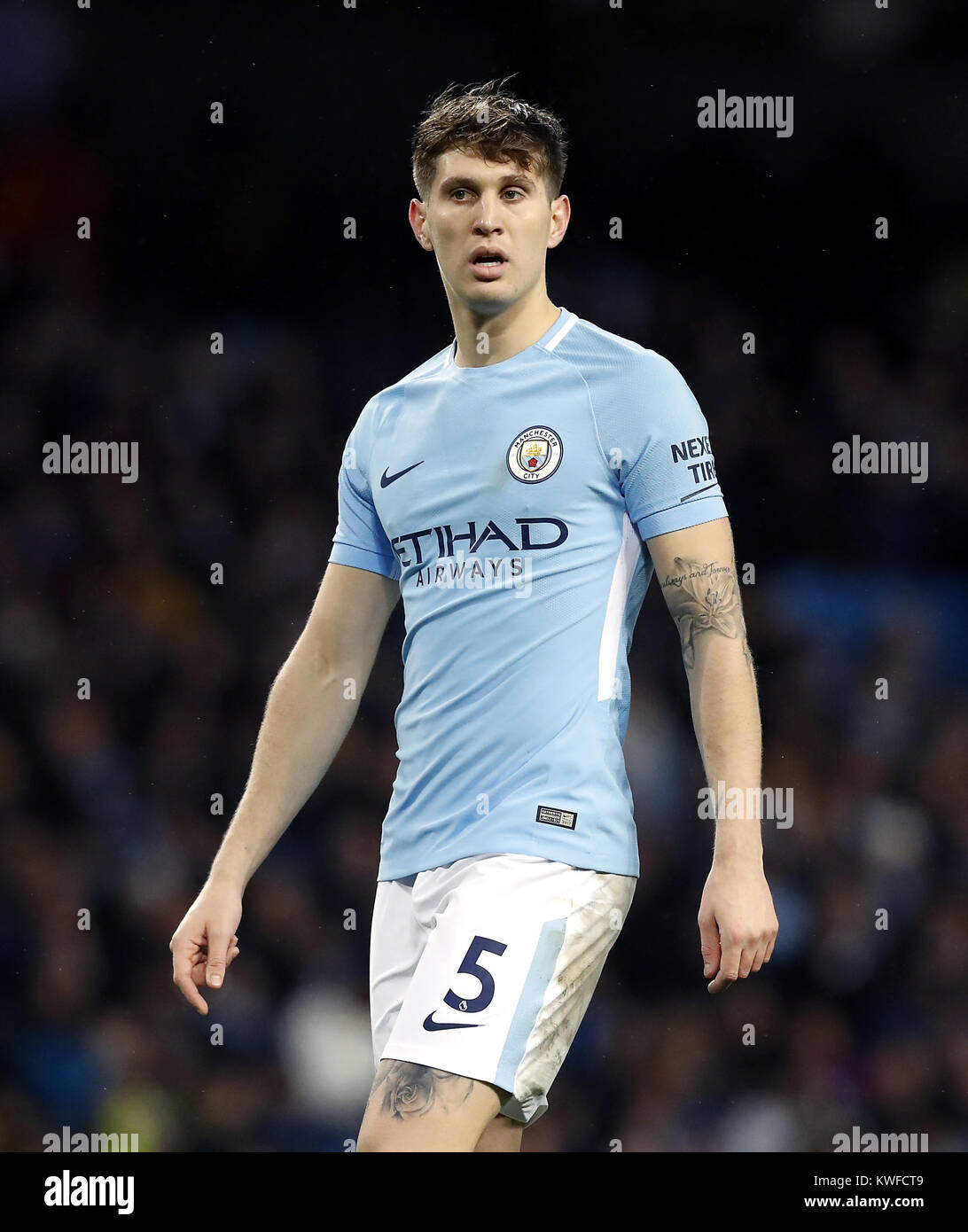 Manchester City's John Stones during the Premier League match at the Etihad Stadium, Manchester. PRESS ASSOCIATION Photo. Picture date: Tuesday January 2, 2018. See PA story SOCCER Man City. Photo credit should read: Martin Rickett/PA Wire. RESTRICTIONS: No use with unauthorised audio, video, data, fixture lists, club/league logos or 'live' services. Online in-match use limited to 75 images, no video emulation. No use in betting, games or single club/league/player publications. Stock Photo