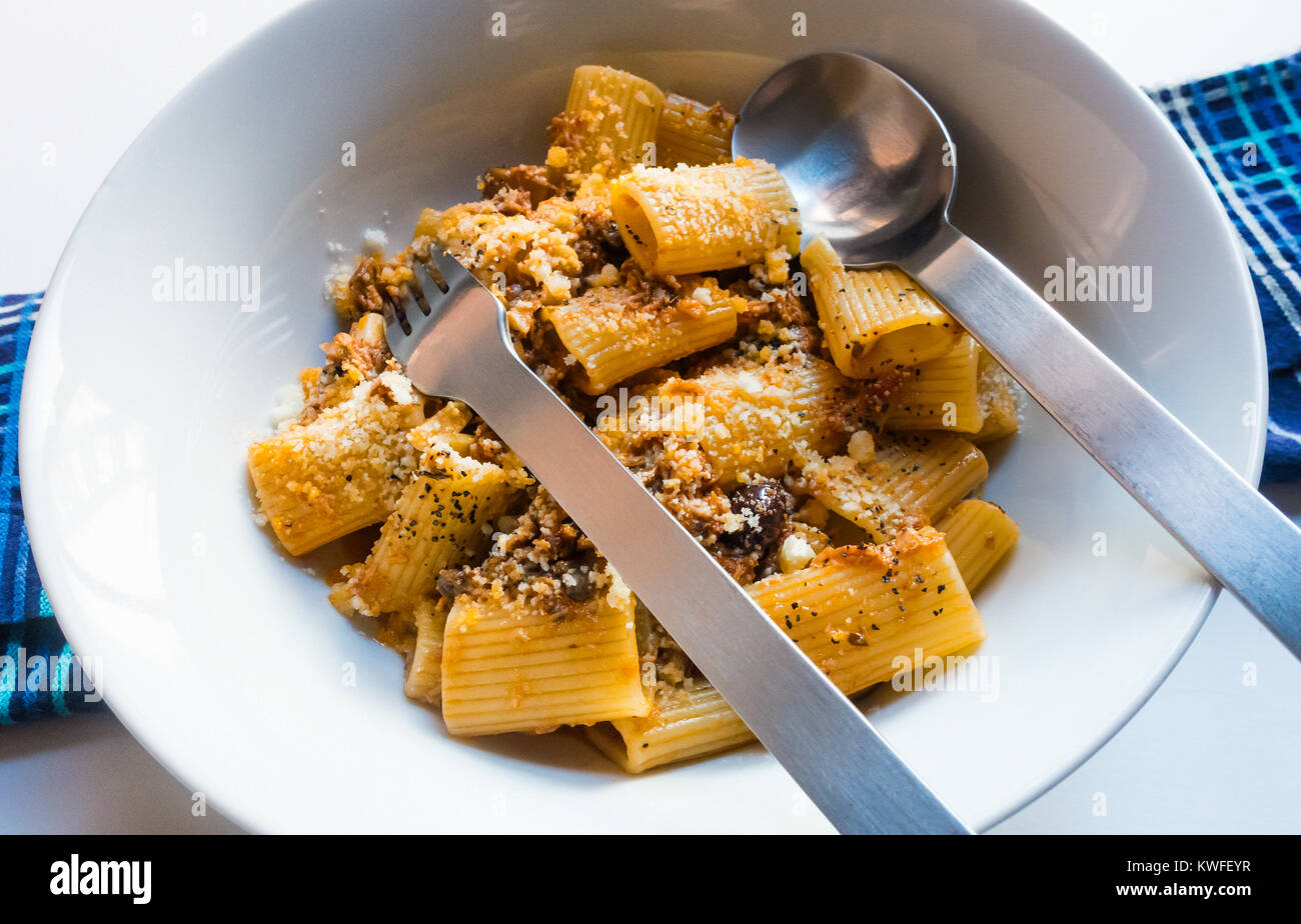 Rigatoni Bolognese, large pasta tubes with a savory meat sauce and parmesan cheese Stock Photo