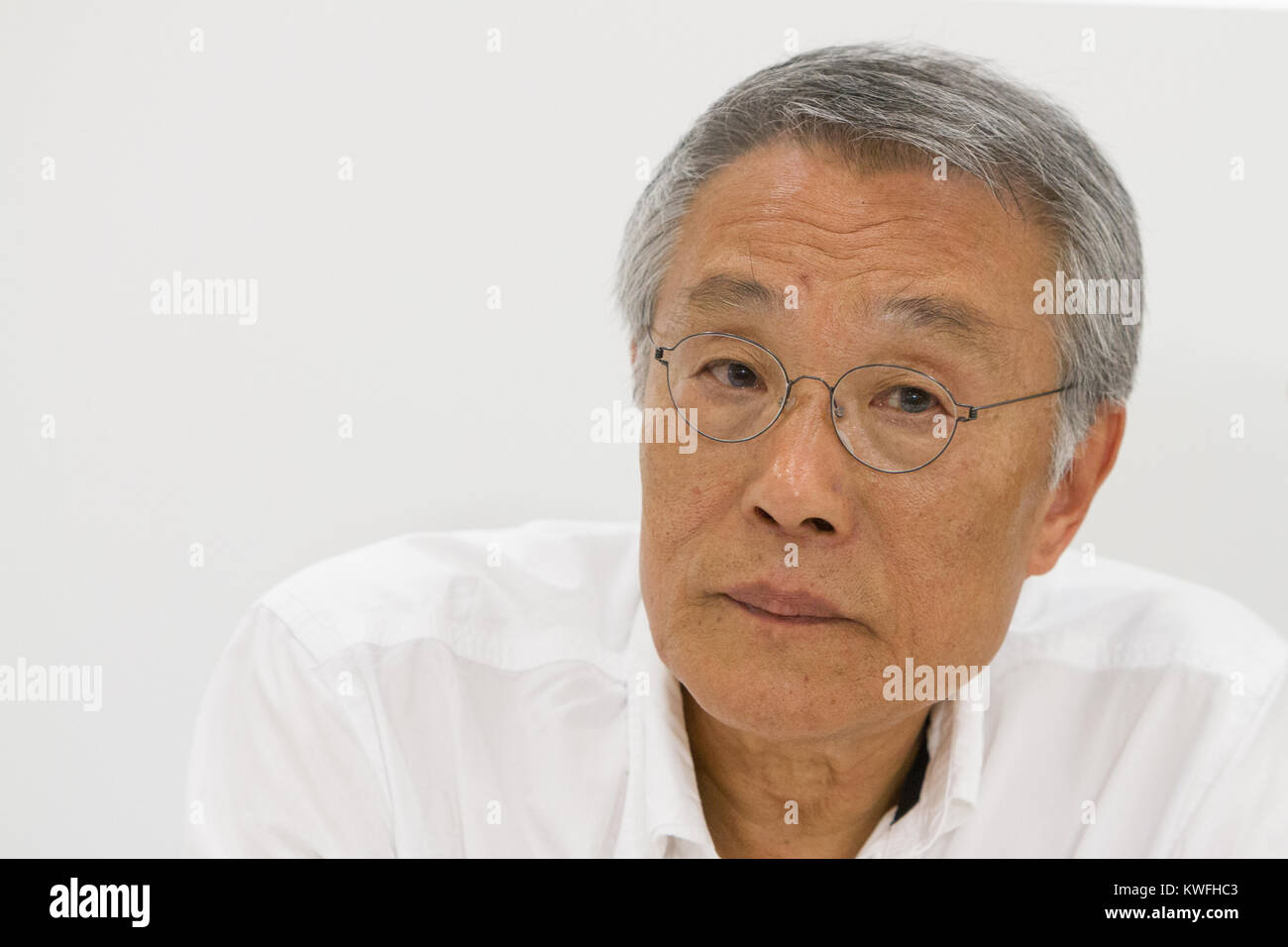 Korean writer Hwang Sok-yong (Hwang Seok-yeong) during a conference at Torino Book Fair Stock Photo