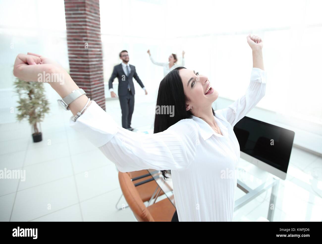 successful happy business woman sitting at the desk Stock Photo - Alamy