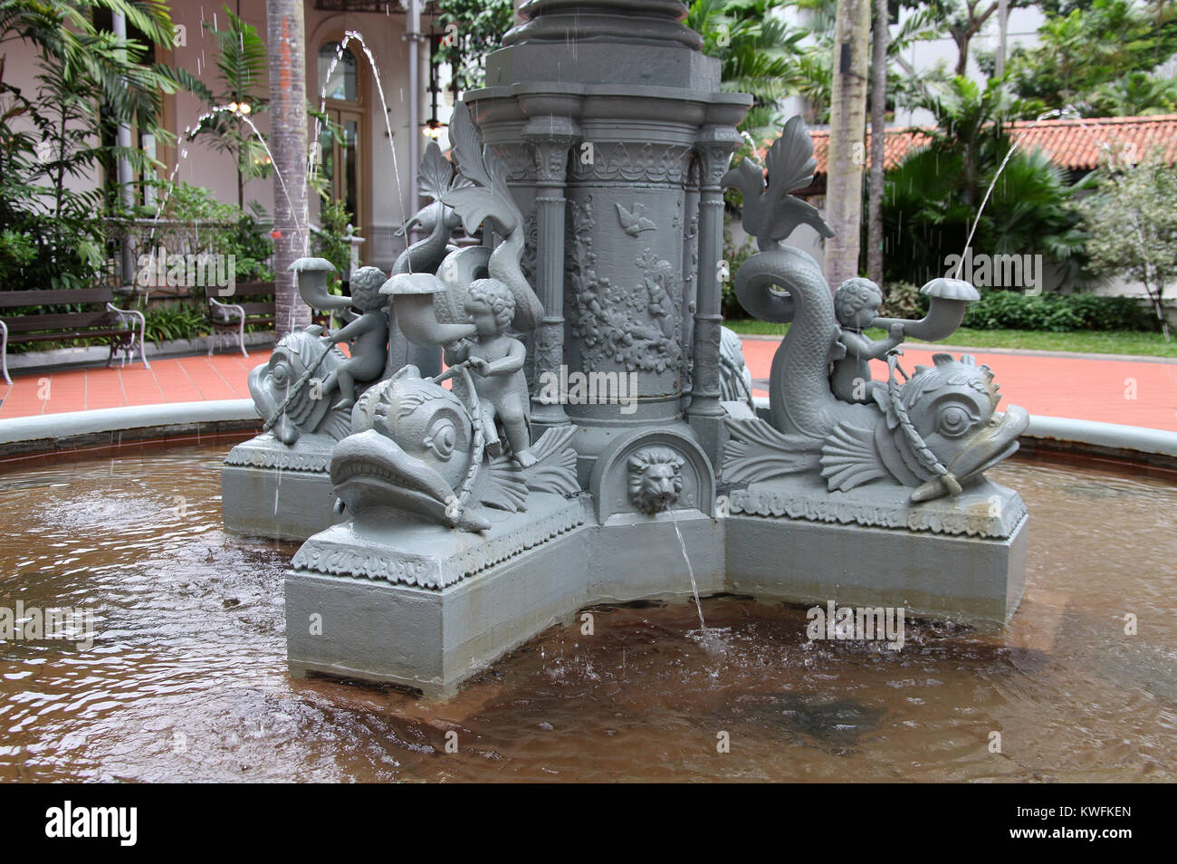 Water fountain in the courtyard at Raffles Hotel in Singapore Stock Photo