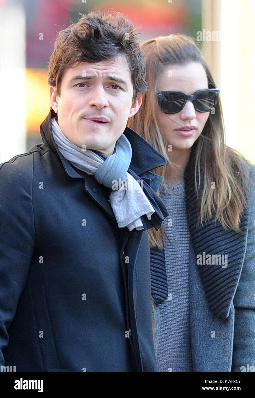 New York October 30 Orlando Bloom And Wife Miranda Kerr Cover Up Baby Son Flynn After Eating Lunch In Manhattan On October 30 2011 In New York City People Orlando Bloom