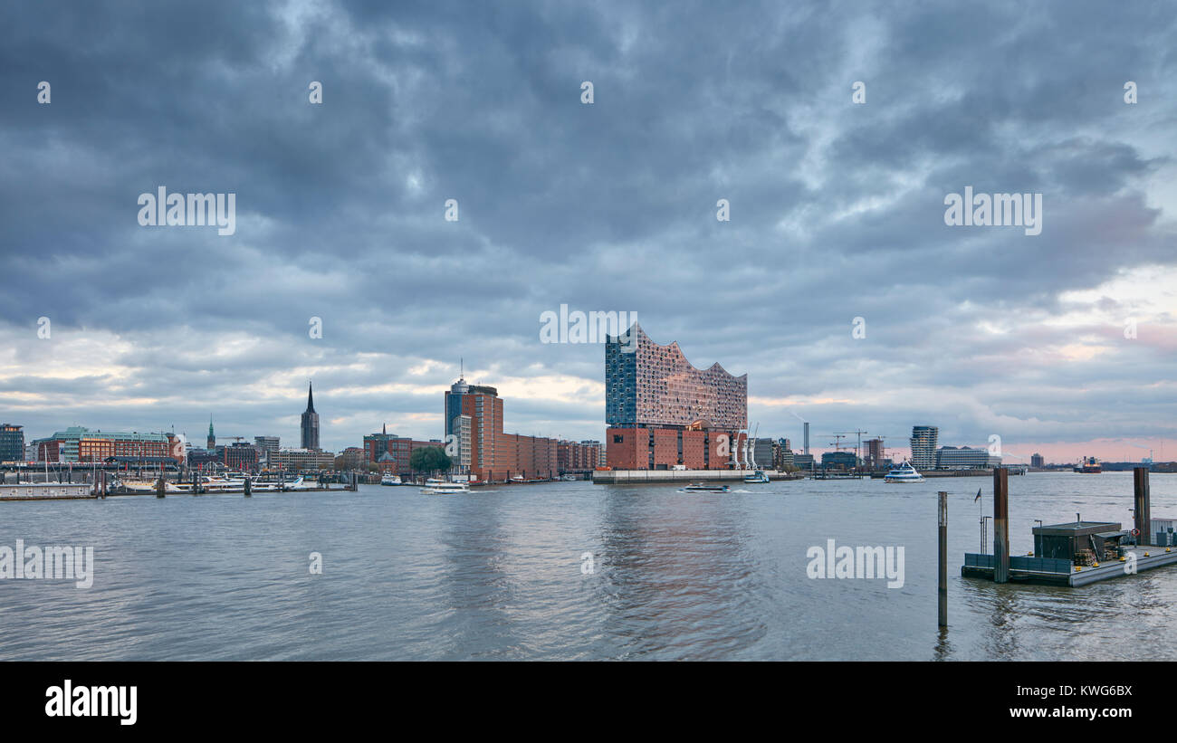 Elbphilharmonie, concert hall by architects Herzog and de Meuron at the River Elbe, HafenCity, Hamburg, Germany. View at dawn. Stock Photo