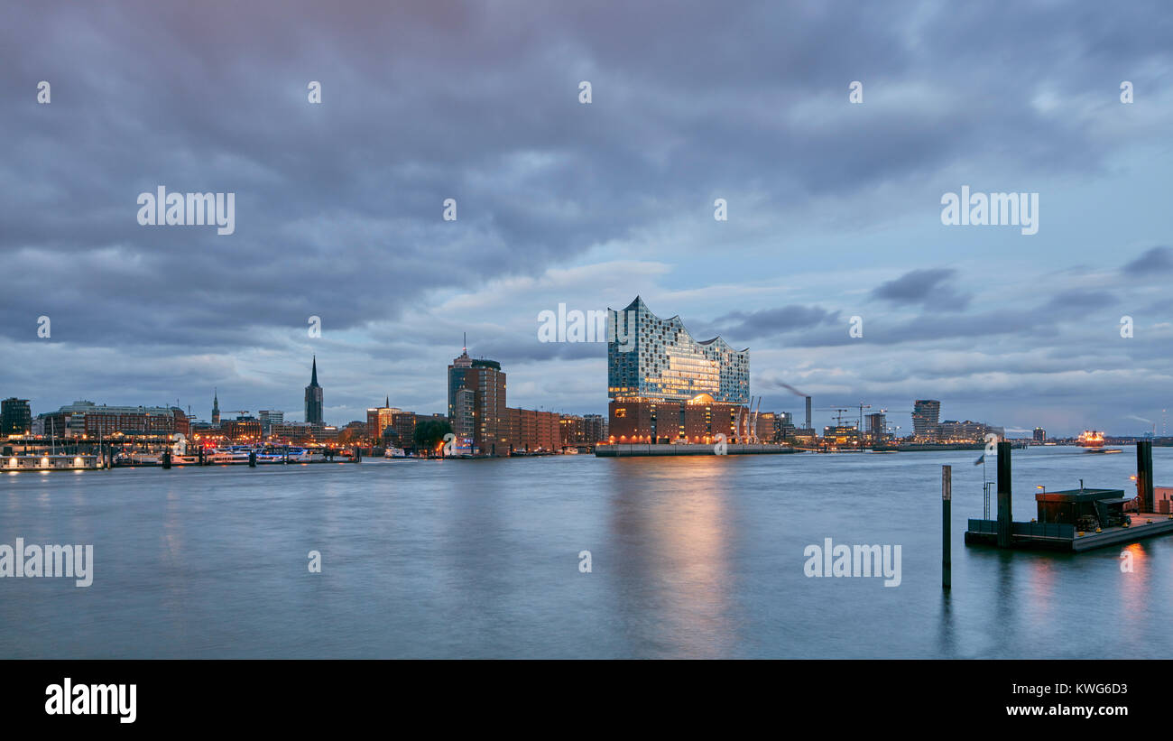 Elbphilharmonie, concert hall by architects Herzog and de Meuron at the River Elbe, HafenCity, Hamburg, Germany. View at dawn. Stock Photo