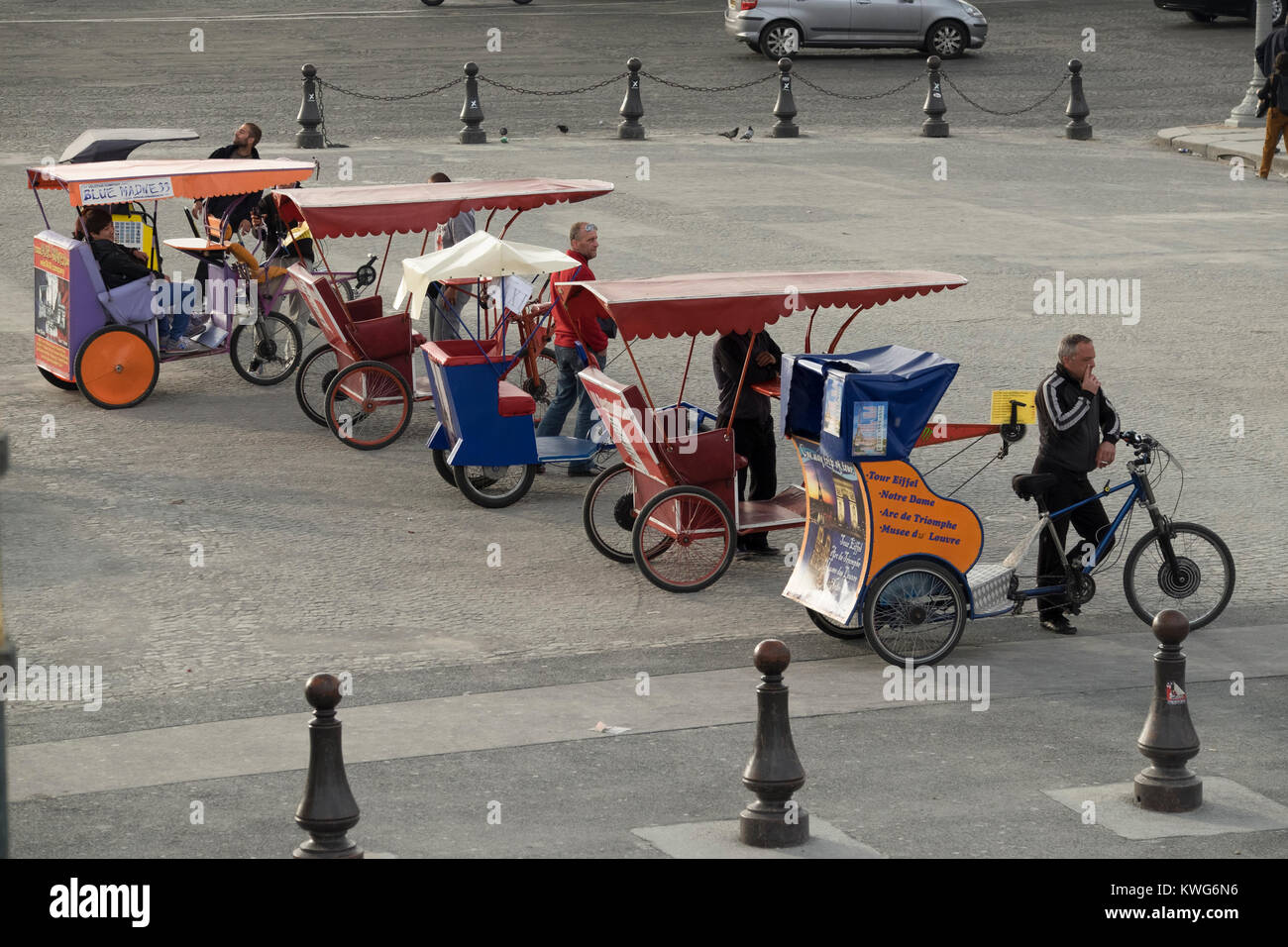 France, Paris (75), Pedicabs waiting for fares outside of the Tuileries Garden Stock Photo