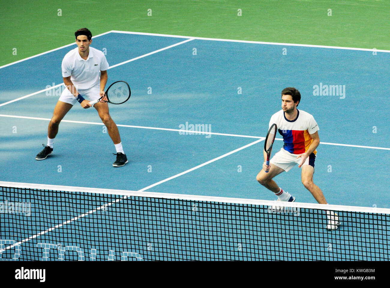 Pune, India. 2nd Jan, 2018. Pierre-Hugues Herbert and Gilles Simon of France in action in the first round of Doubles competition at Tata Open Maharashtra at the Mahalunge Balewadi Tennis Stadium in Pune, India. Credit: Karunesh Johri/Alamy Live News Stock Photo