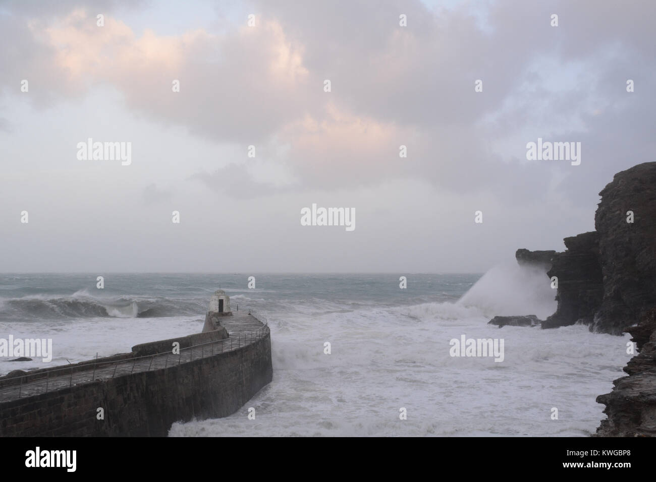 Portreath, Cornwall, UK. 3rd Jan, 2018. UK Weather. In the early hours of the morning huge swell and waves destroyed a 40ft section of the harbour wall at Portreath. The wall divides the car park - which overlooks the sea - from a small beach and the local pub. Police cordoned off the car park. Credit: Simon Maycock/Alamy Live News Stock Photo