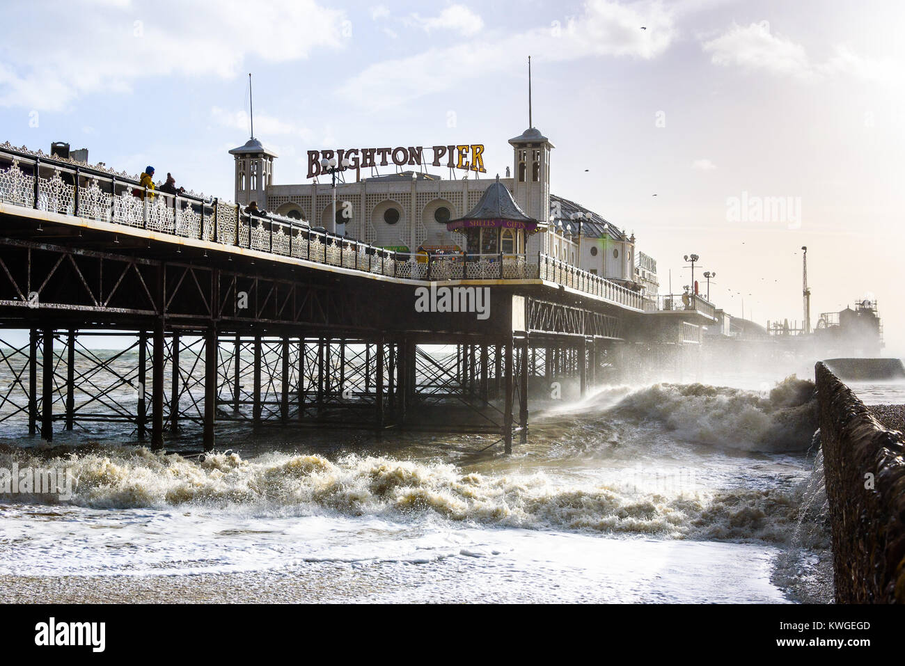 Brighton, UK. 03rd Jan, 2018. Storm waves surge by Brighton Pier at