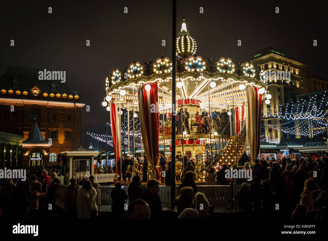 Moscow, the Russian Federation - January 02, 2018: Muscovites riding the carousel mounted in the downtown for New Year's holidays. Credit: Sergey Podkolzin/Alamy Live News Stock Photo