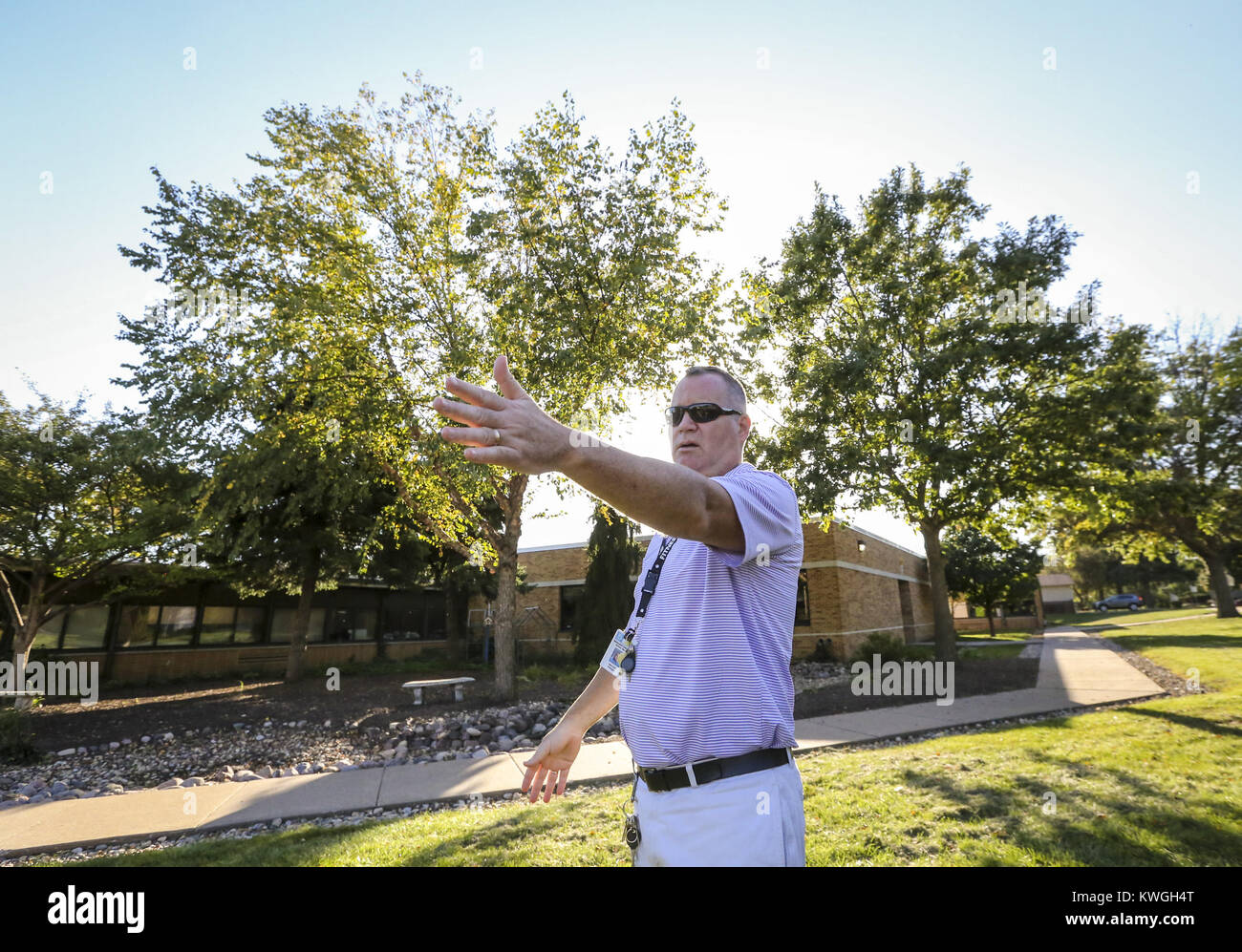 Davenport, Iowa, USA. 5th Oct, 2016. Principal John Cain points out where the front of the school will expand to at Grant Wood Elementary School in Bettendorf Wednesday, October 5, 2016. The school consistently must turn away students in its region as it already has its capacity of 375 students. The school hopes to break ground on April 1st for what is proposed to be an 18-month renovation and addition project that will ultimately expand the school's capacity to 454 students. Credit: Andy Abeyta/Quad-City Times/ZUMA Wire/Alamy Live News Stock Photo