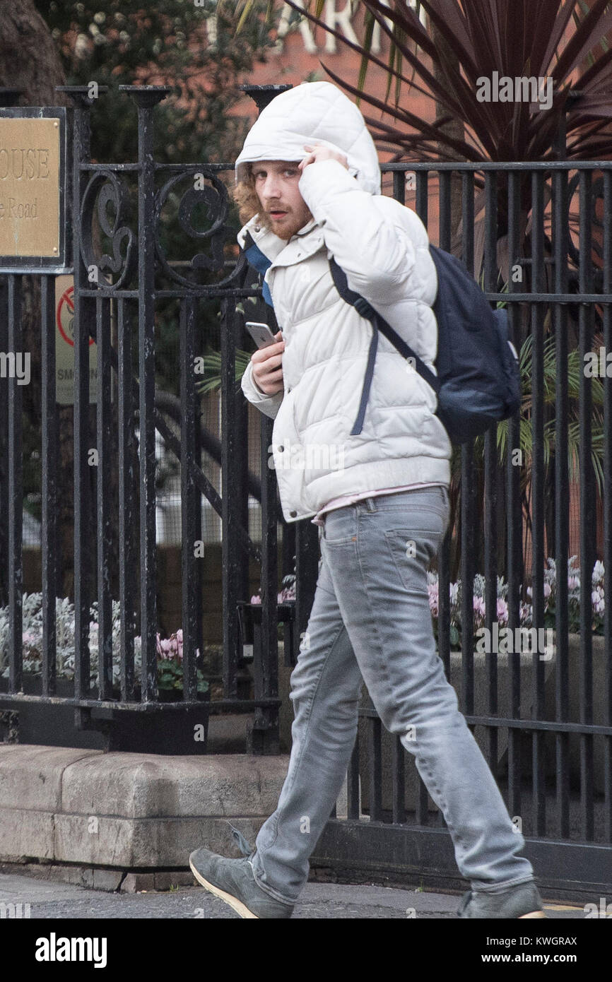 Cosmo Buck-Taylor leaves Westminster Magistrates' Court in London where he appeared charged with using threatening, abusive words or behaviour. Stock Photo