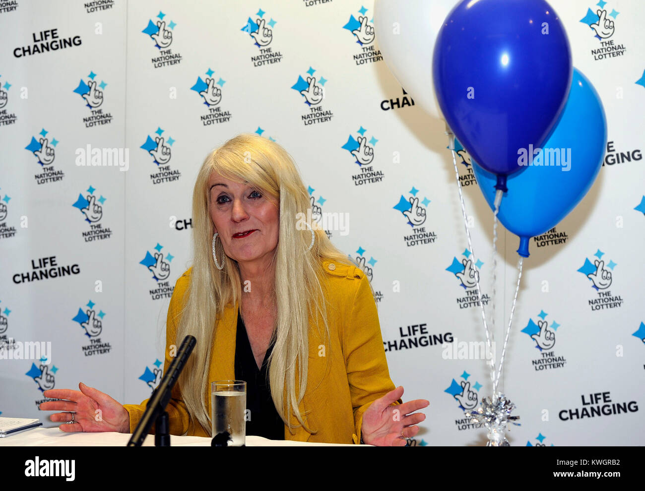 Taxi driver Melissa Ede, 57, celebrating during a photocall at Willerby Manor Hotel in Hull after her £4m Scratchcard win on New Year's Day. Stock Photo