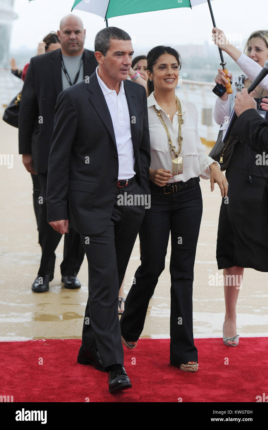 FORT LAUDERDALE, FL - OCTOBER 16: Salma Hayek and Antonio Banderas arrive at the Allure Of The Seas Premiere Of Puss In Boots at Port Everglades. The event was very unorganized and the actors looked miserable.  On October 16, 2011 in Fort Lauderdale, Florida   People:  Salma Hayek Antonio Banderas Stock Photo
