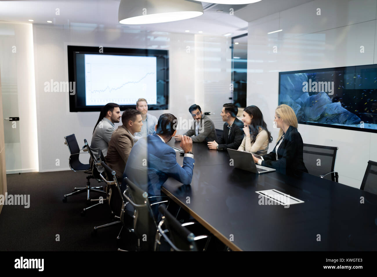 Picture of businesspeople having meeting in conference room Stock Photo ...