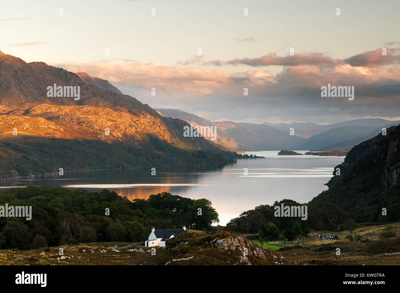 The beautiful view down Loch Maree from near Tollie Farm at Poolewe on the NC500 route, towards sunset in September Stock Photo