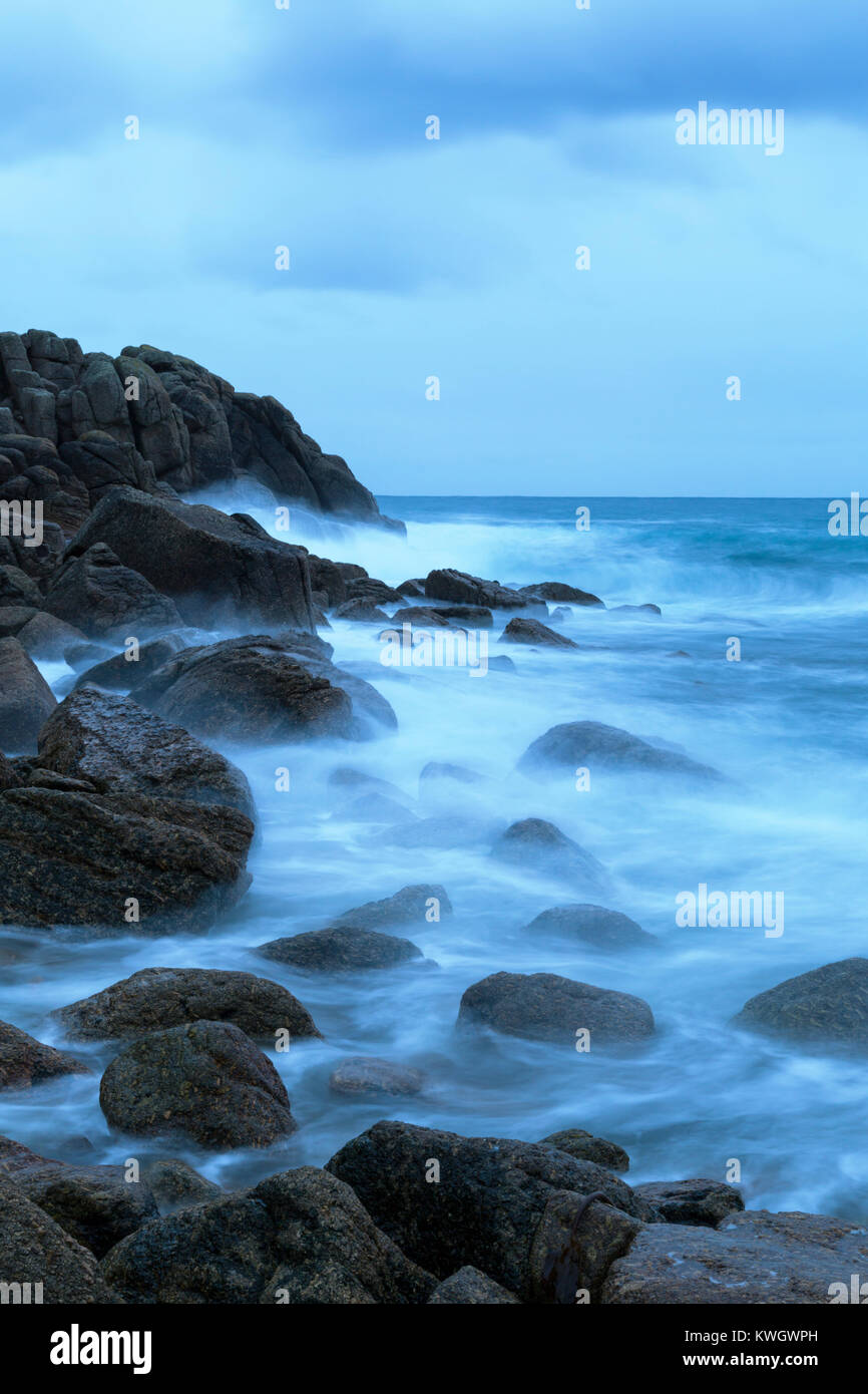 The blue hour before dawn at Porthgwarra Cove in West Cornwall Stock Photo