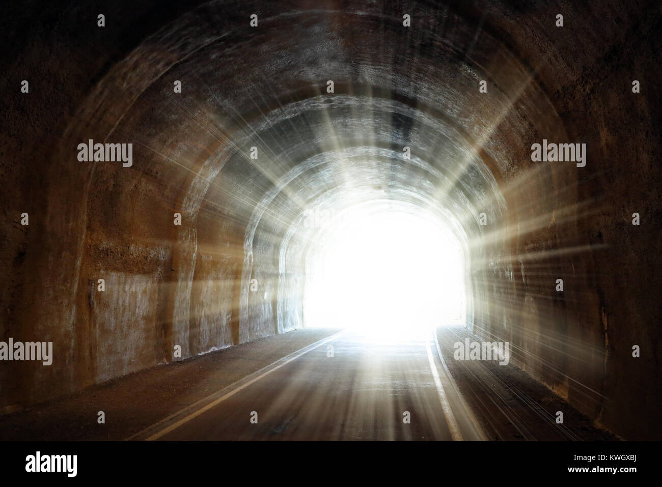 Shining light at the end of the tunnel Stock Photo