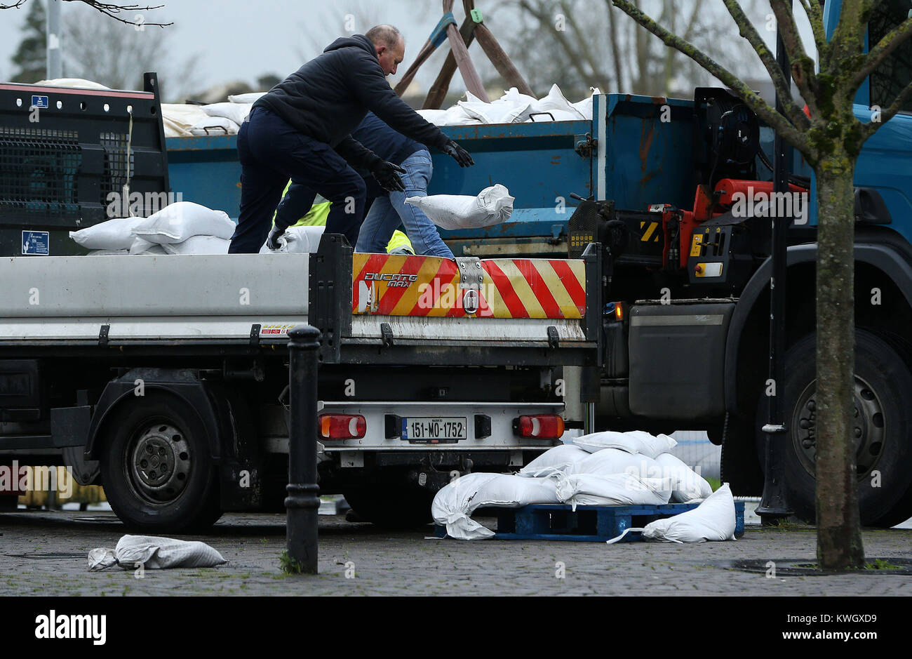Sandbags are delivered on Spanish Parade in Galway, as Storm Eleanor lashed the UK and Ireland with violent storm-force winds of up to 100mph, leaving thousands of homes without power and hitting transport links. Picture date: Wednesday January 3, 2018. Widespread disruption is expected on Wednesday after the storm swept across the country overnight carrying heavy rain, hail and dramatic thunder and lightning. See PA story WEATHER Gales Ireland. Photo credit should read: Brian Lawless/PA Wire Stock Photo