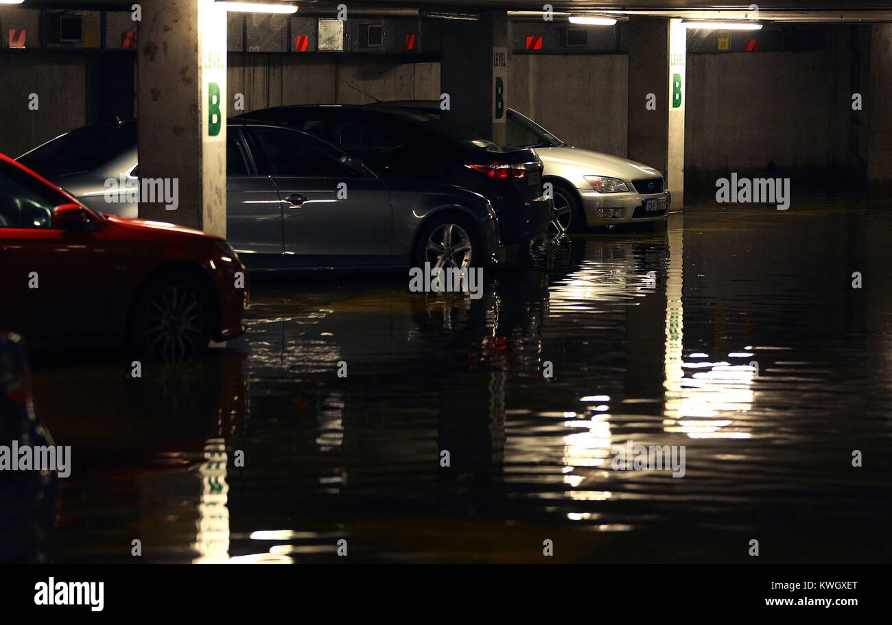 Abandoned cars in a flooded car park in Galway city centre, as Storm Eleanor lashed the UK and Ireland with violent storm-force winds of up to 100mph, leaving thousands of homes without power and hitting transport links. Picture date: Wednesday January 3, 2018. Widespread disruption is expected on Wednesday after the storm swept across the country overnight carrying heavy rain, hail and dramatic thunder and lightning. See PA story WEATHER Gales Ireland. Photo credit should read: Brian Lawless/PA Wire Stock Photo
