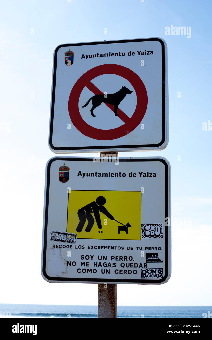 Dog laws signs by the sea shore, El Golfo, Lanzarote, Canary Islands, Spain. Stock Photo