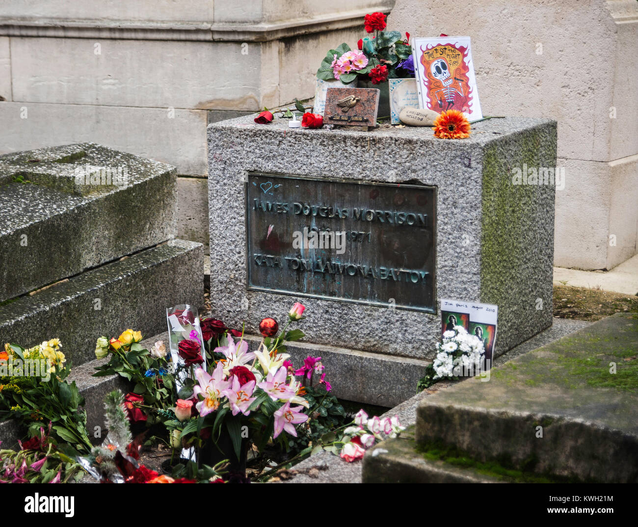 Grave of Jim Morrison (1943-1971), frontman of the american music band The Doors, located in the Pere Lachaise cemetery in Paris, France. Stock Photo