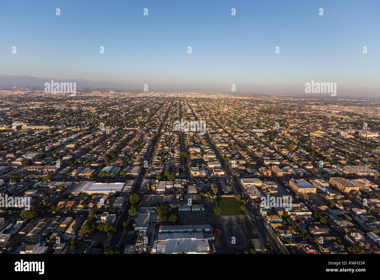 Late afternoon aerial view of buildings and streets in south Los Angeles, California. Stock Photo
