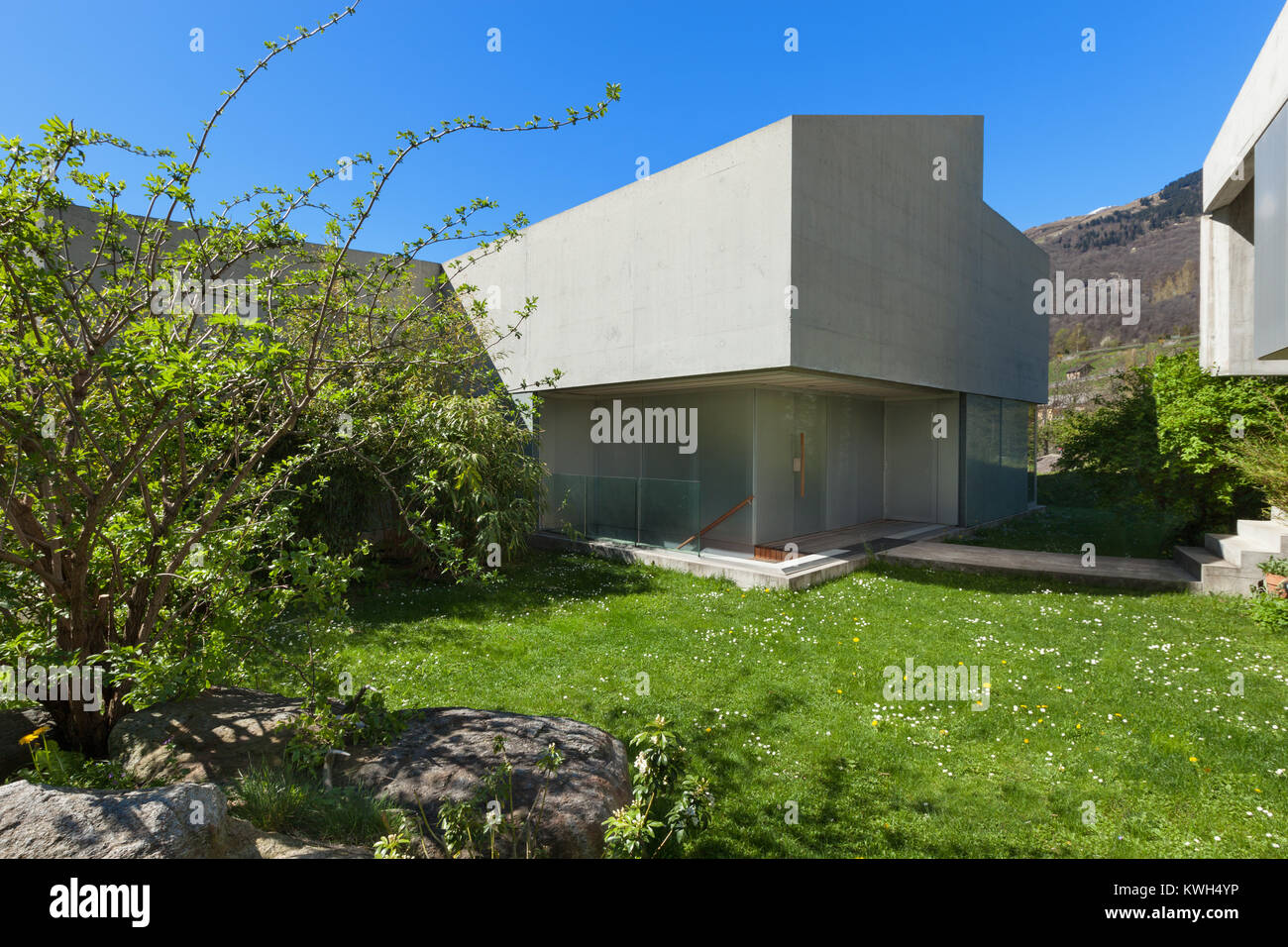Architecture modern design, concrete house view from the garden Stock Photo