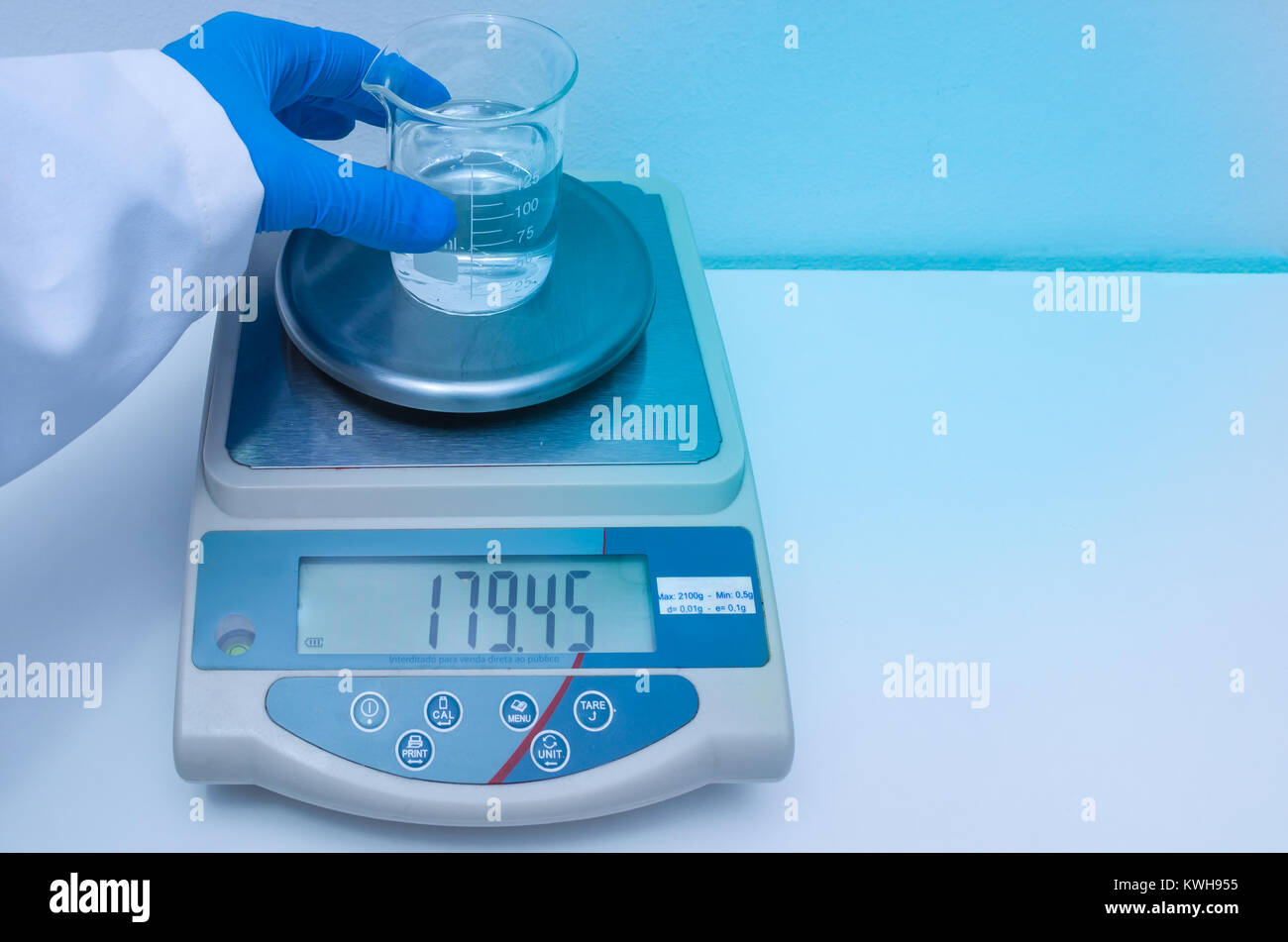Great concept of research and development, hand weighing chemicals on