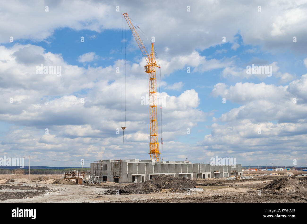 Construction crane against the sky with clouds Stock Photo - Alamy