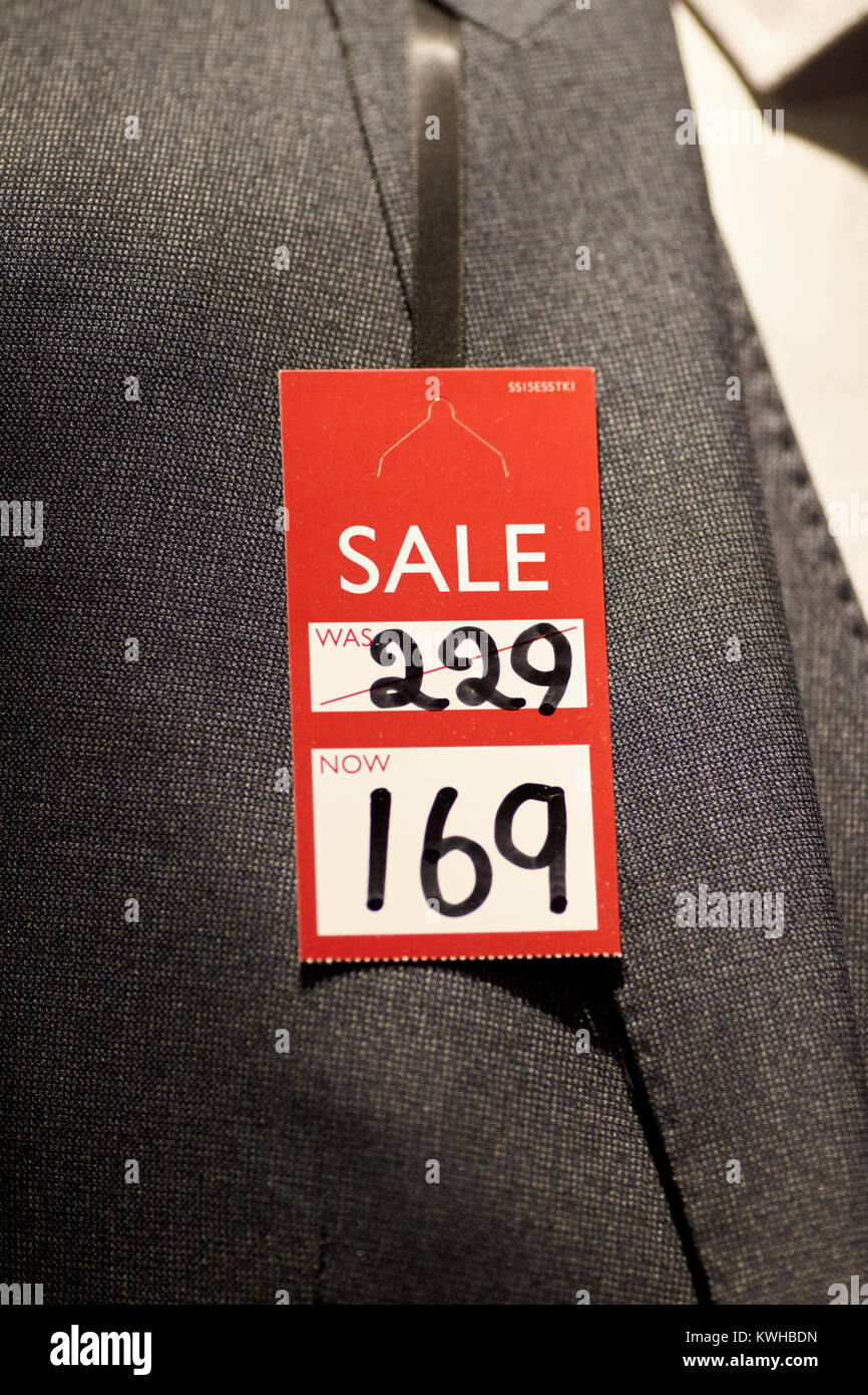 suit marked down on sale in mens clothing shop uk Stock Photo