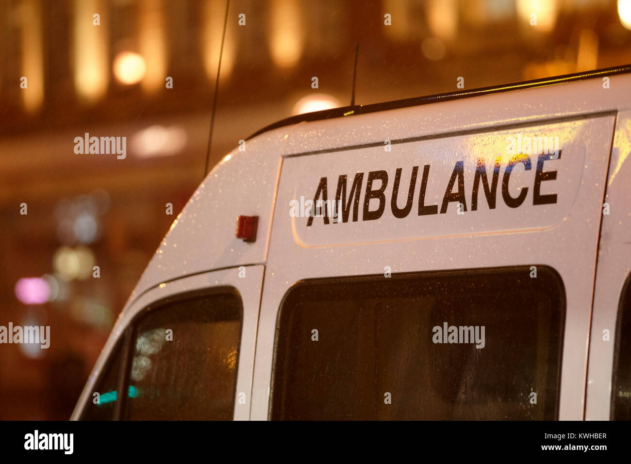 private ambulance waiting in city centre in the rain belfast northern ireland uk Stock Photo