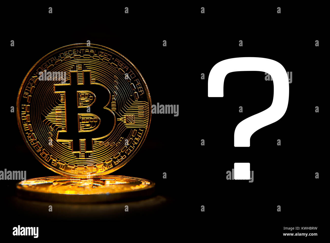 Bit coin isolated on black background with text question Stock Photo